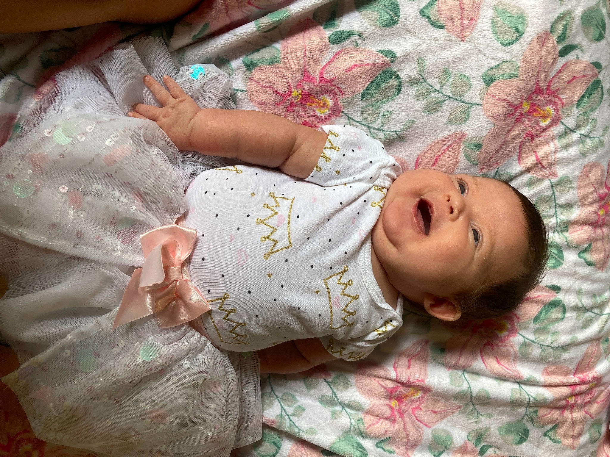 Esme is registered to the contest to win money with this photo: baby, baby_products, baby_safety, baby_toddler_clothing, bedding, bedtime, cheek, child, comfort, eye, finger, hand, iris, linens, pattern, person, pink, room, skin, sleeve