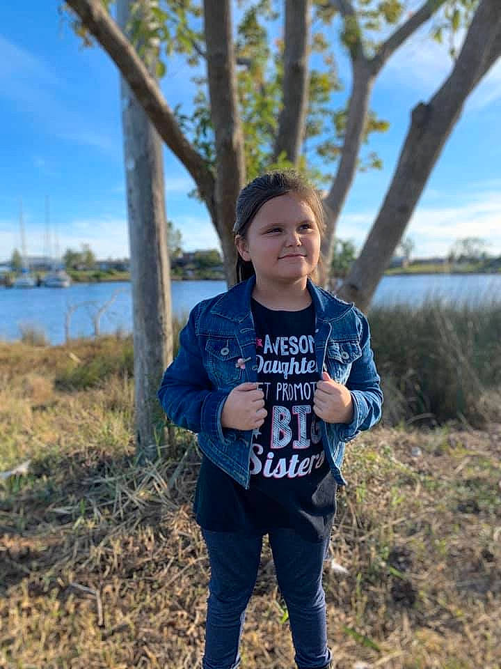 Railynn joined the competition — help win amazing prizes! child, face, facial_expression, fun, grass, happy, jacket, joy, leisure, mountain, outerwear, people, person, photography, plant, recreation, sky, smile, t_shirt, top