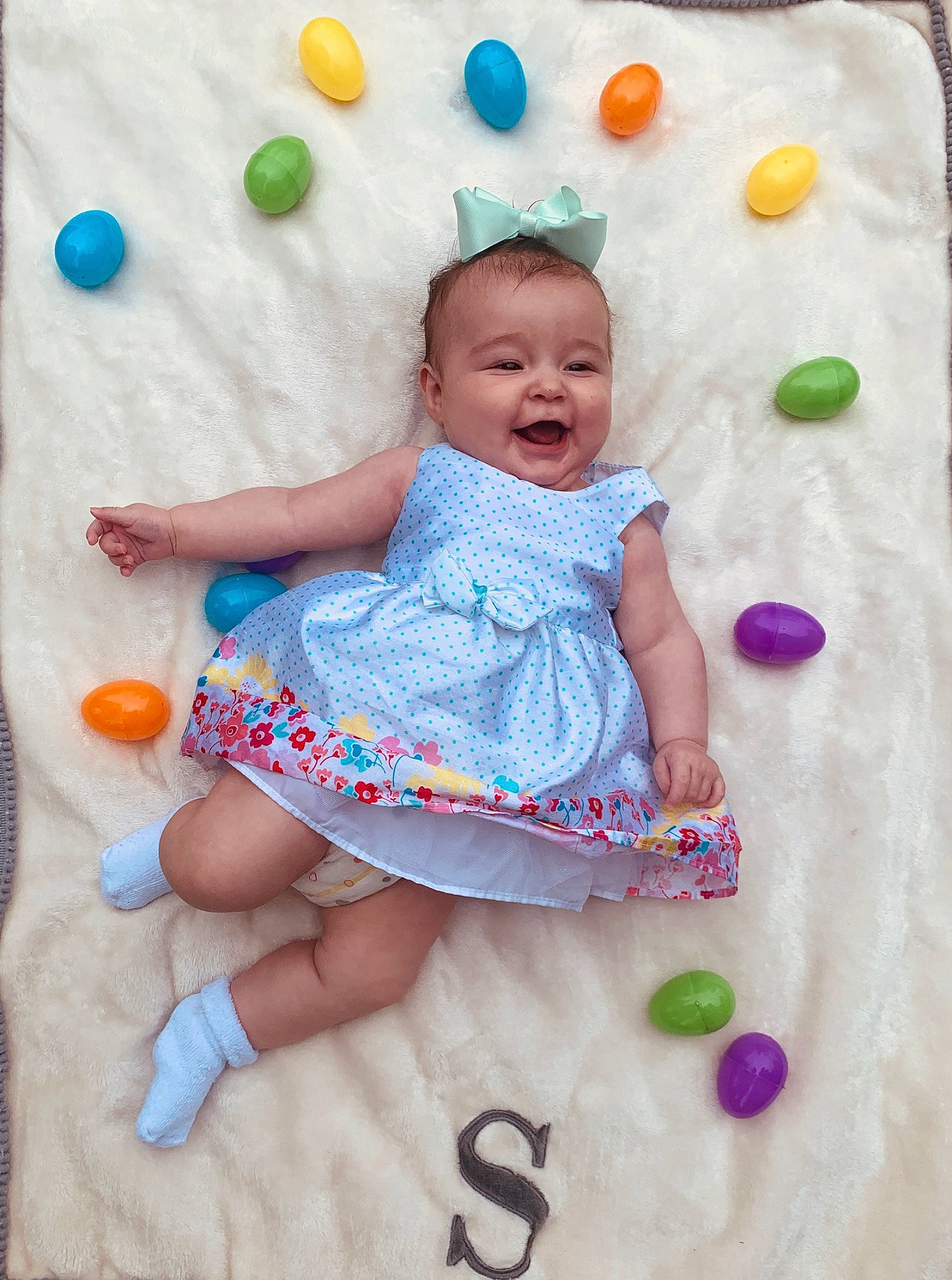 Scarlett is registered to the contest to win money with this photo: baby, blanket, child, fun, happy, linens, nap_mat, pattern, person, play, smile, textile, toddler