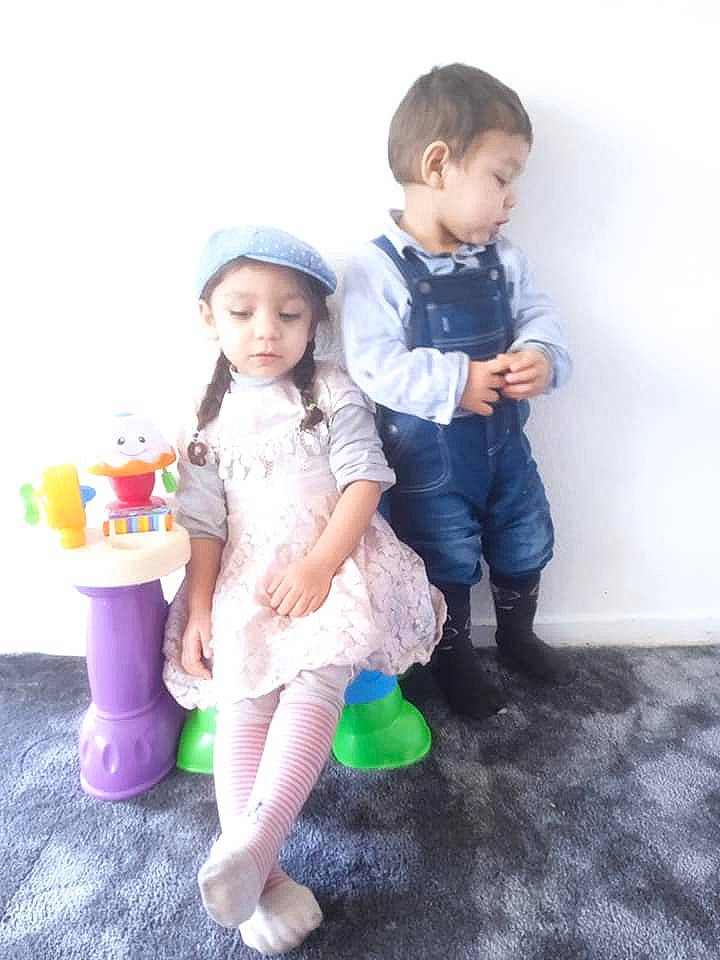 Melissa participe au concours pour gagner de l'argent avec cette photo : baby, baby_toddler_clothing, child, electric_blue, fun, gesture, happy, hat, headwear, magenta, person, play, product, shoe, sitting, skin, sleeve, standing, t_shirt, teddy_bear