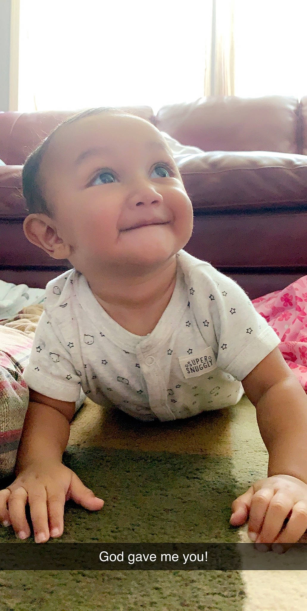 Jaycob is registered to the contest to win money with this photo: baby, cheek, child, crawling, face, head, joy, nose, person, play, sitting, skin, smile, toddler, tummy_time