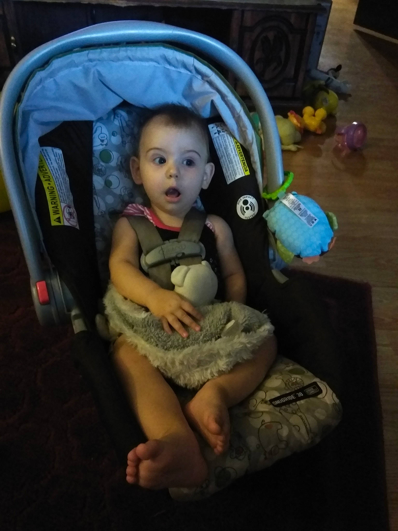 Monika is registered to the contest to win money with this photo: baby, car_seat, chair, cheek, child, eye, fun, iris, person, sitting, skin, smile, surprise, toddler