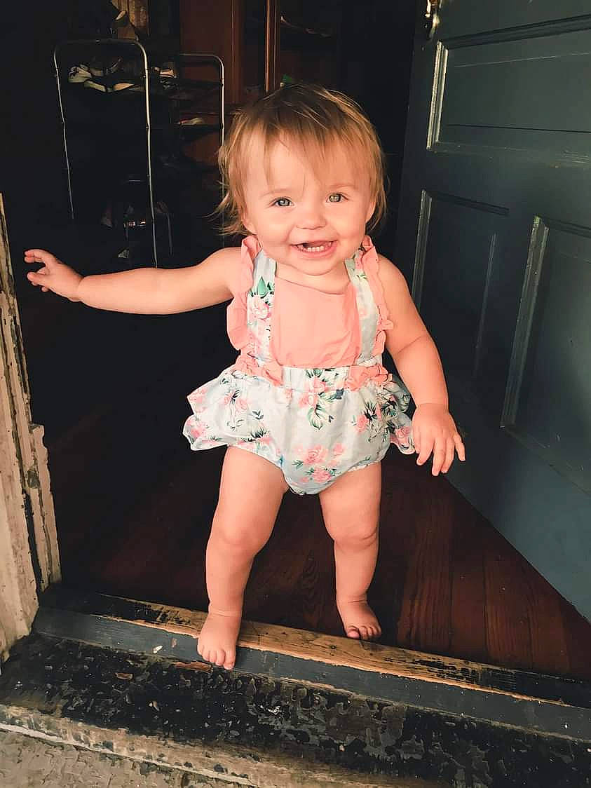 Nylah is registered to the contest to win money with this photo: baby_toddler_clothing, child, dress, eye, finger, flash_photography, fun, hairstyle, hand, happy, human_body, joint, joy, leg, person, pink, shoulder, skin, smile, summer