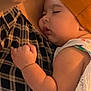 baby, sleeping, hat, orange, plaid, shirt, arm, hand, closeup, peaceful, child, person, infant, nap, cozy, skin, cute, resting, toddler, clothing