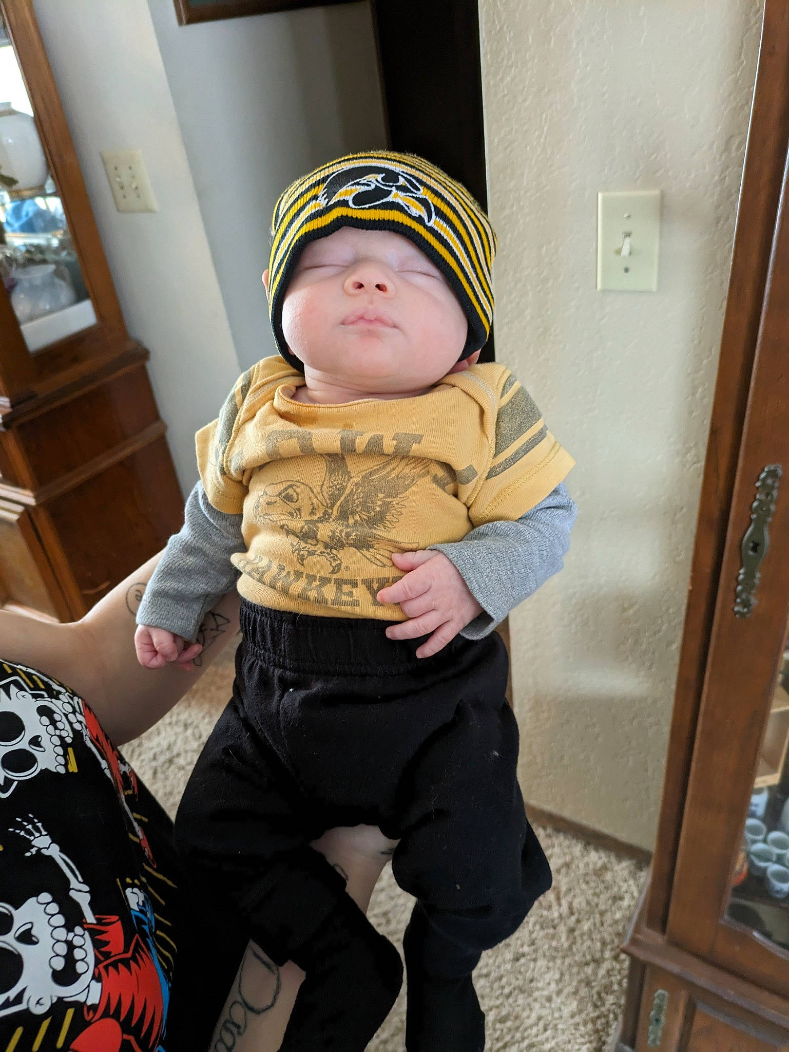 Levi joined the competition — help win amazing prizes! baby, baby_toddler_clothing, beanie, cap, child, comfort, costume, fashion_accessory, fun, goggles, happy, helmet, person, personal_protective_equipment, sitting, sleeve, sock, sports_gear, t_shirt, thigh