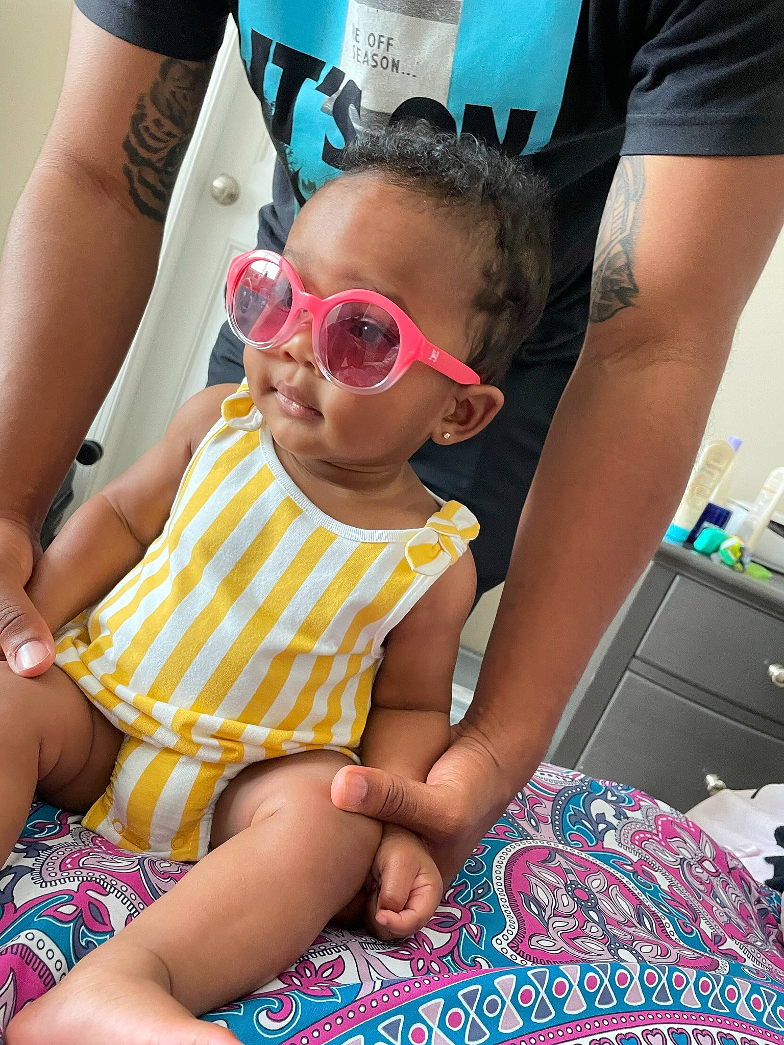 Kaylani Amil is registered to the contest to win money with this photo: baby_toddler_clothing, blue, child, dress, eyewear, fashion, fun, glasses, goggles, hairstyle, happy, leg, leisure, mouth, person, shorts, skin, sunglasses, thigh, toddler
