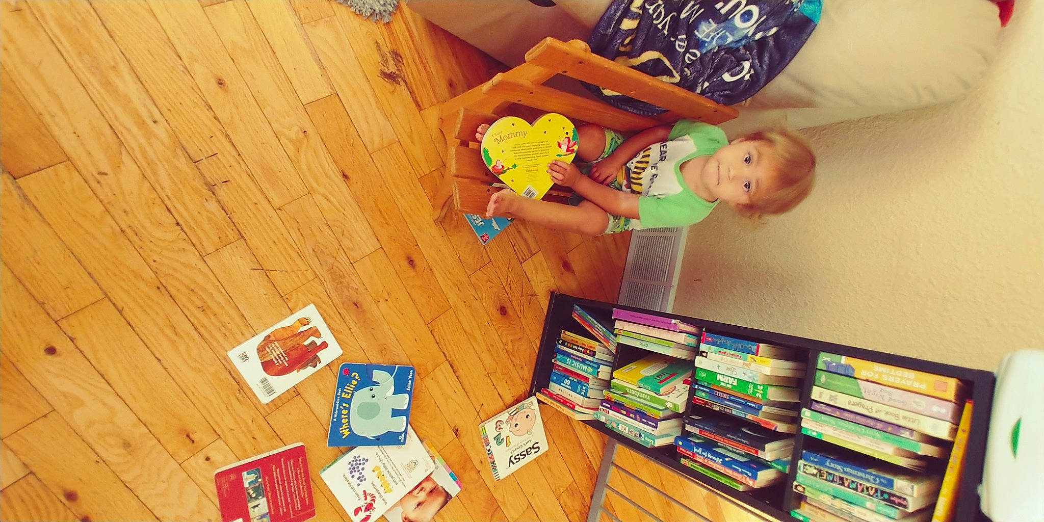 Julius joined the competition — help win amazing prizes! baby, book, bookcase, child, cloud, flooring, happy, hardwood, person, play, publication, recreation, room, shelf, shelving, table, toddler, toy, varnish, wood