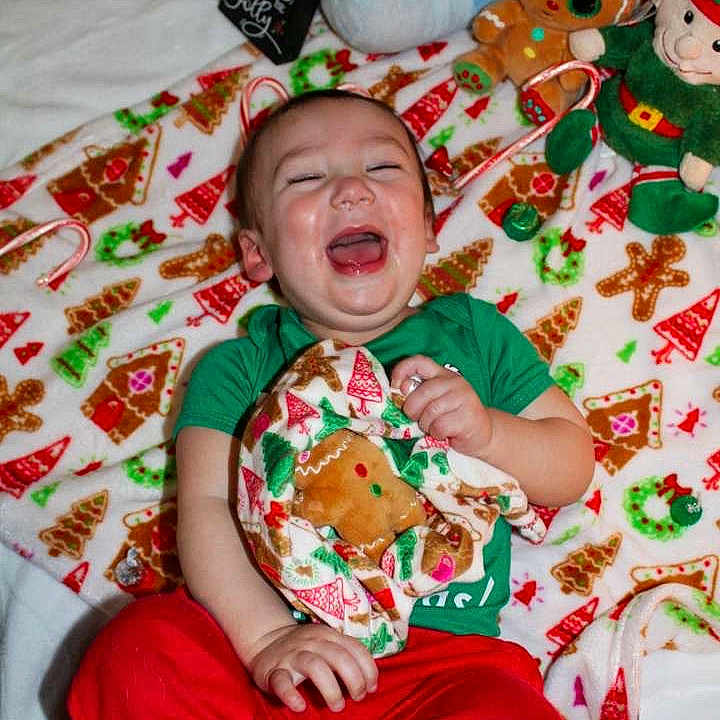 Luca is registered to the contest to win money with this photo: baby, ball, crying, cushion, face, football, furniture, happy, head, homedecor, laughing, person, photography, portrait, quilt, sad, soccer, soccerball, sport, toy