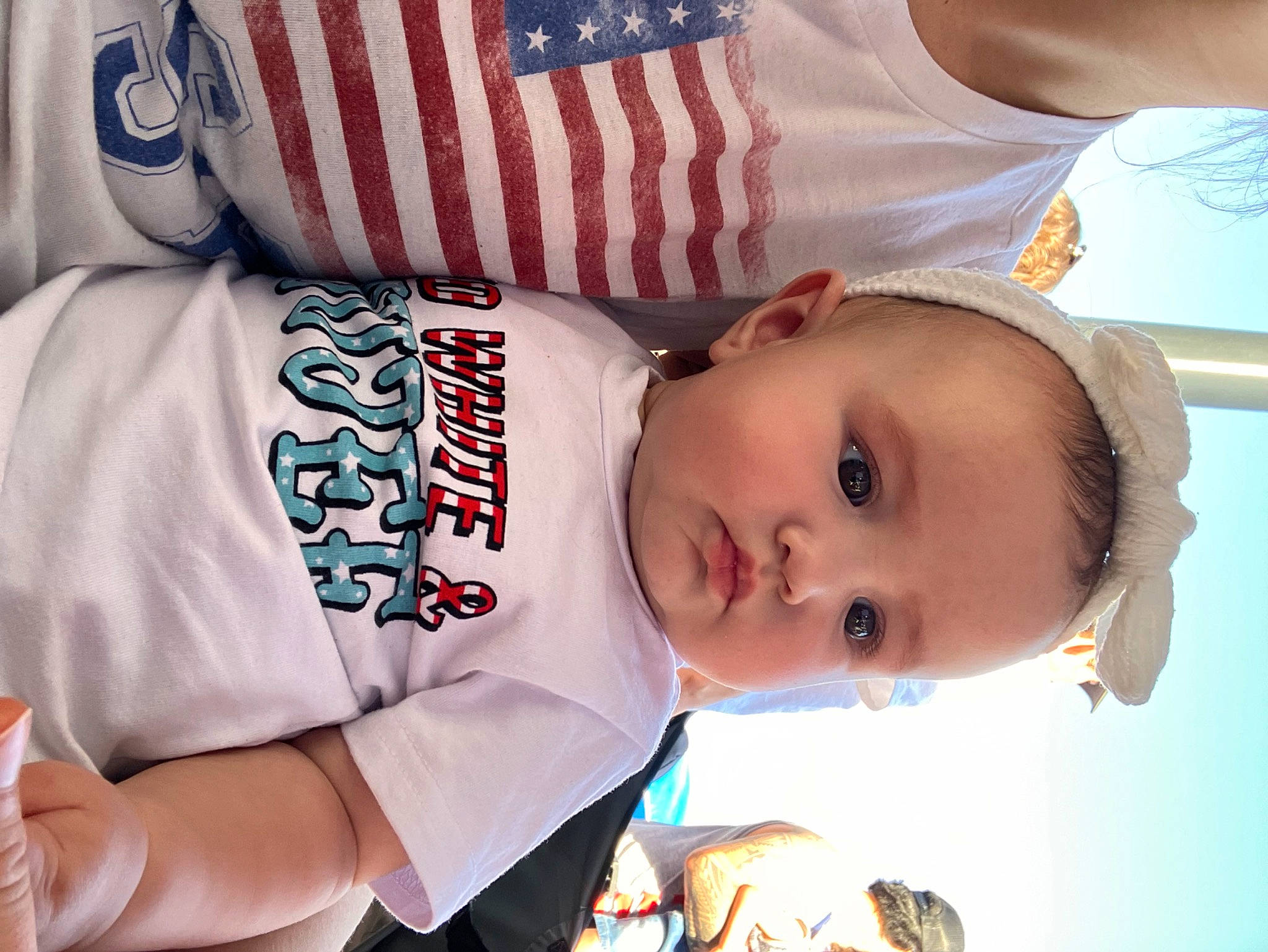 Alesana is registered to the contest to win money with this photo: baby, baby_products, baby_toddler_clothing, carmine, cheek, child, elbow, eyelash, flag_of_the_united_states, fun, hand, happy, hat, person, sleeve, toddler