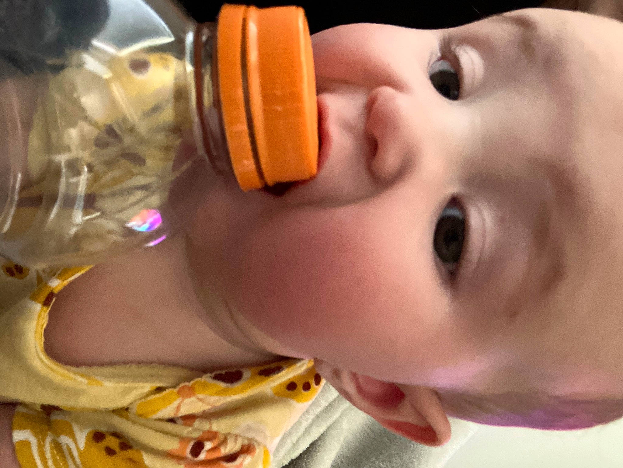 Alesana is registered to the contest to win money with this photo: cheek, child, chin, drinkware, ear, eyebrow, eyelash, fun, lip, mouth, neck, nose, person, plastic_bottle, skin, smile, toddler, toy, water, white