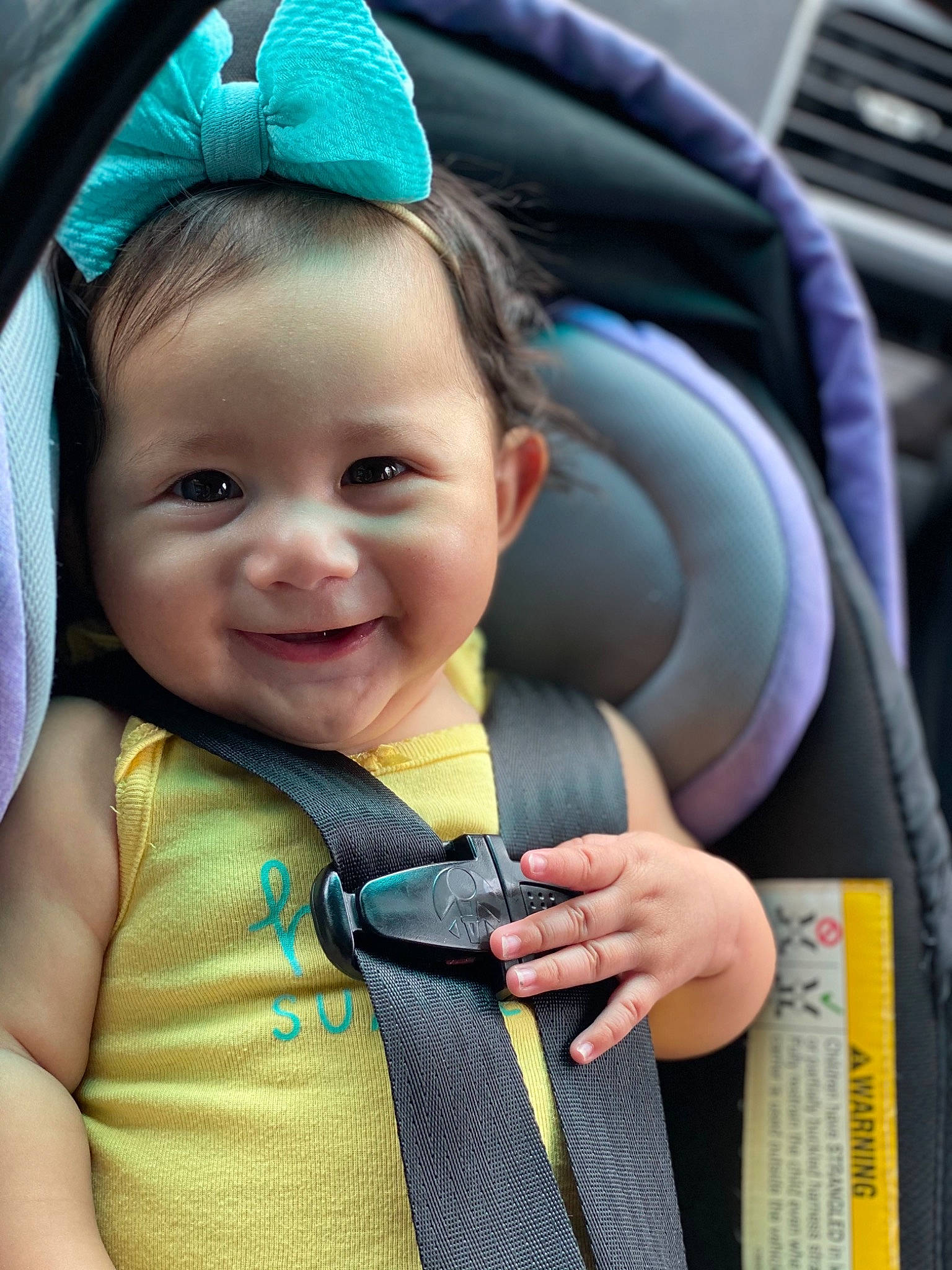 Thalia Estrella joined the competition — help win amazing prizes! baby, baby_carriage, baby_toddler_clothing, blue, cheek, chin, cool, eye, eyebrow, facial_expression, fun, happy, iris, joy, nose, outerwear, person, product, seat_belt, skin