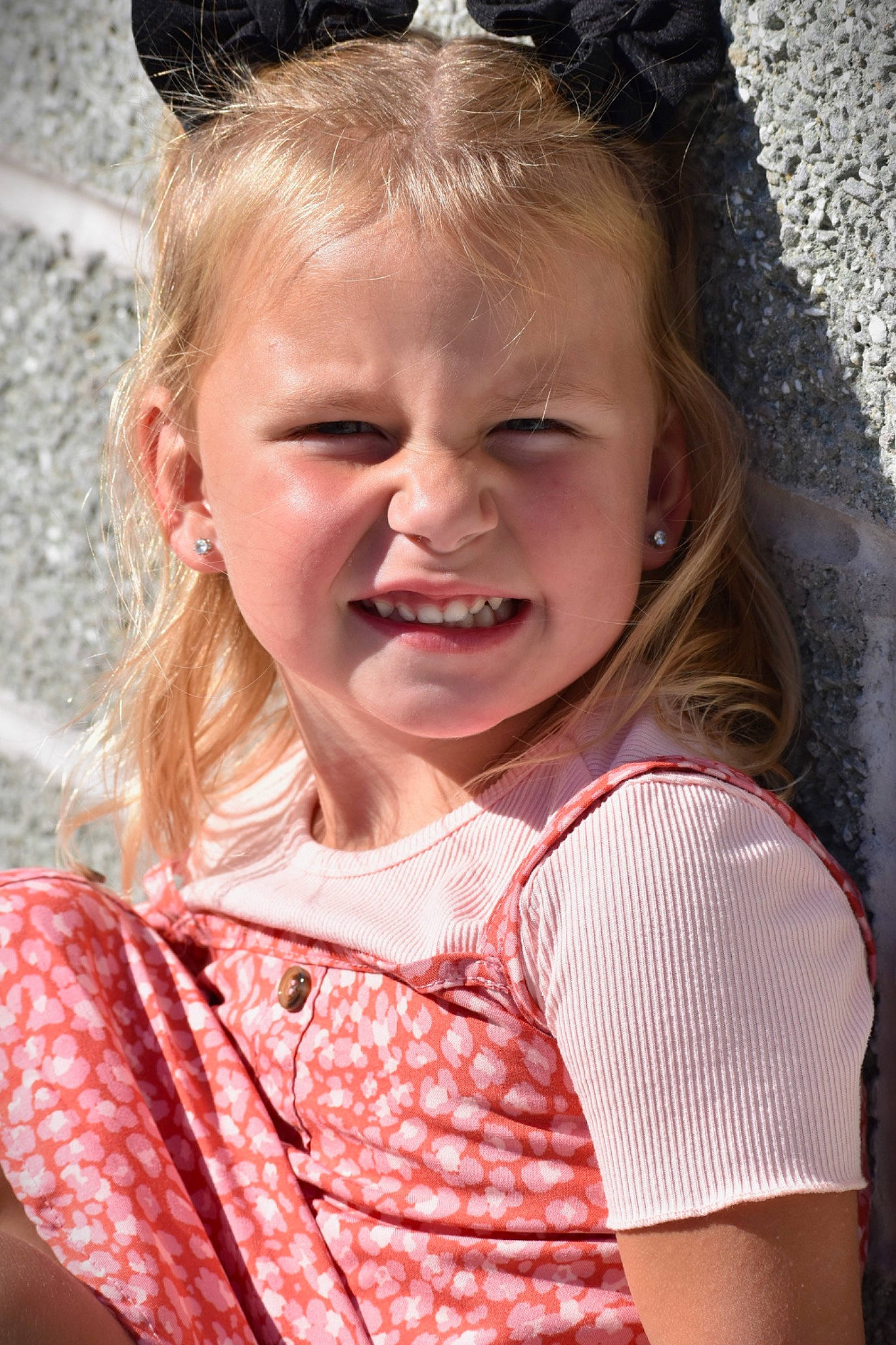 Brynlee joined the competition — help win amazing prizes! baby_toddler_clothing, cheek, face, fun, gesture, grass, hair, hairstyle, happy, head, iris, lip, mouth, neck, nose, person, pink, skin, sleeve, smile