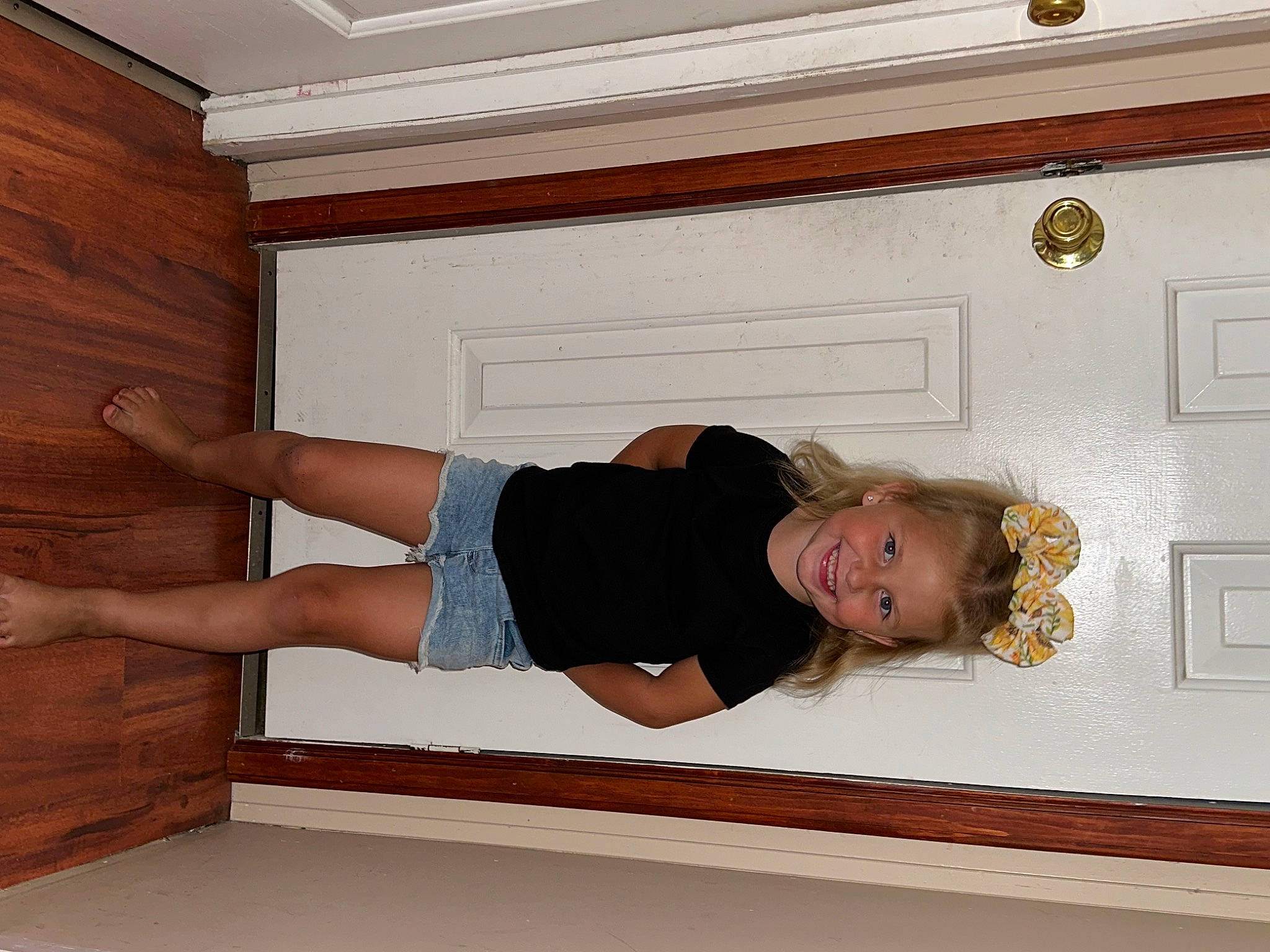 Brynlee joined the competition — help win amazing prizes! abdomen, balance, comfort, elbow, floor, flooring, foot, hardwood, human_leg, joy, knee, molding, person, rectangle, room, sitting, sleeve, thigh, varnish, waist