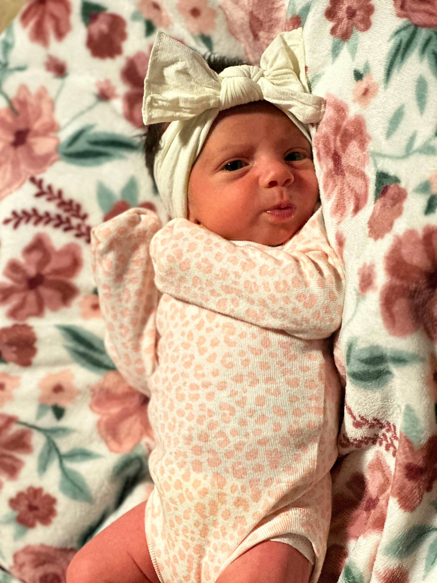 Everleigh is registered to the contest to win money with this photo: baby, baby_sleeping, baby_toddler_clothing, cap, cheek, child, comfort, eye, face, happy, hat, head, headgear, headwear, linens, pattern, person, pink, skin, sleeve