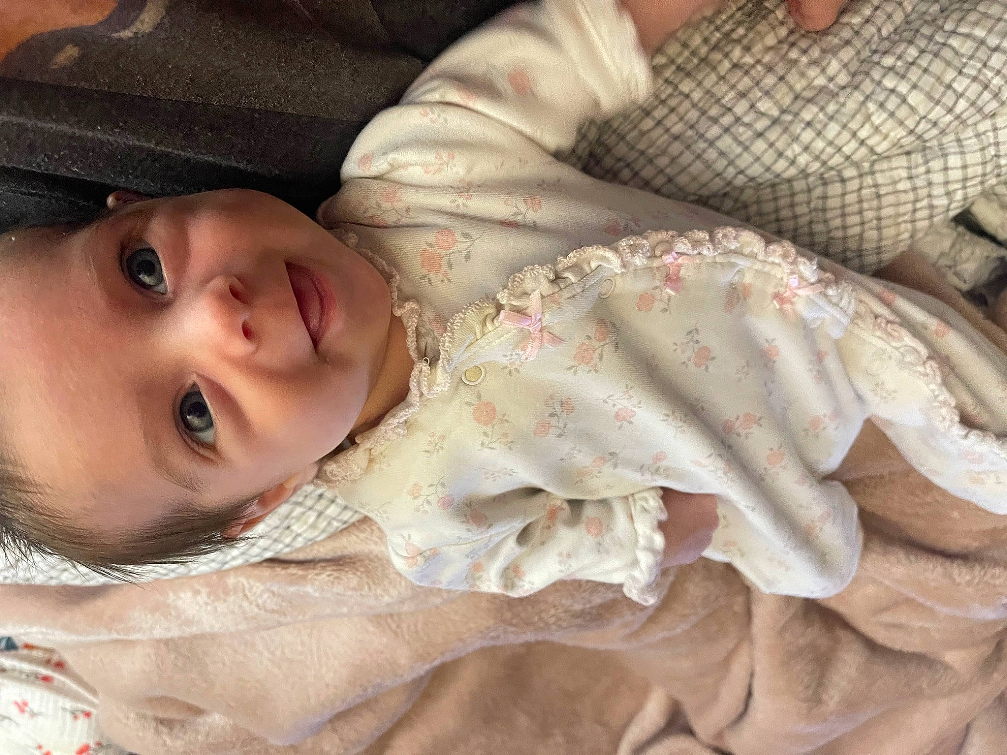 Everleigh is registered to the contest to win money with this photo: abdomen, baby, baby_sleeping, baby_toddler_clothing, cheek, chest, child, comfort, eye, eyelash, linens, lip, mouth, nose, pattern, person, skin, sleeve, smile, toddler