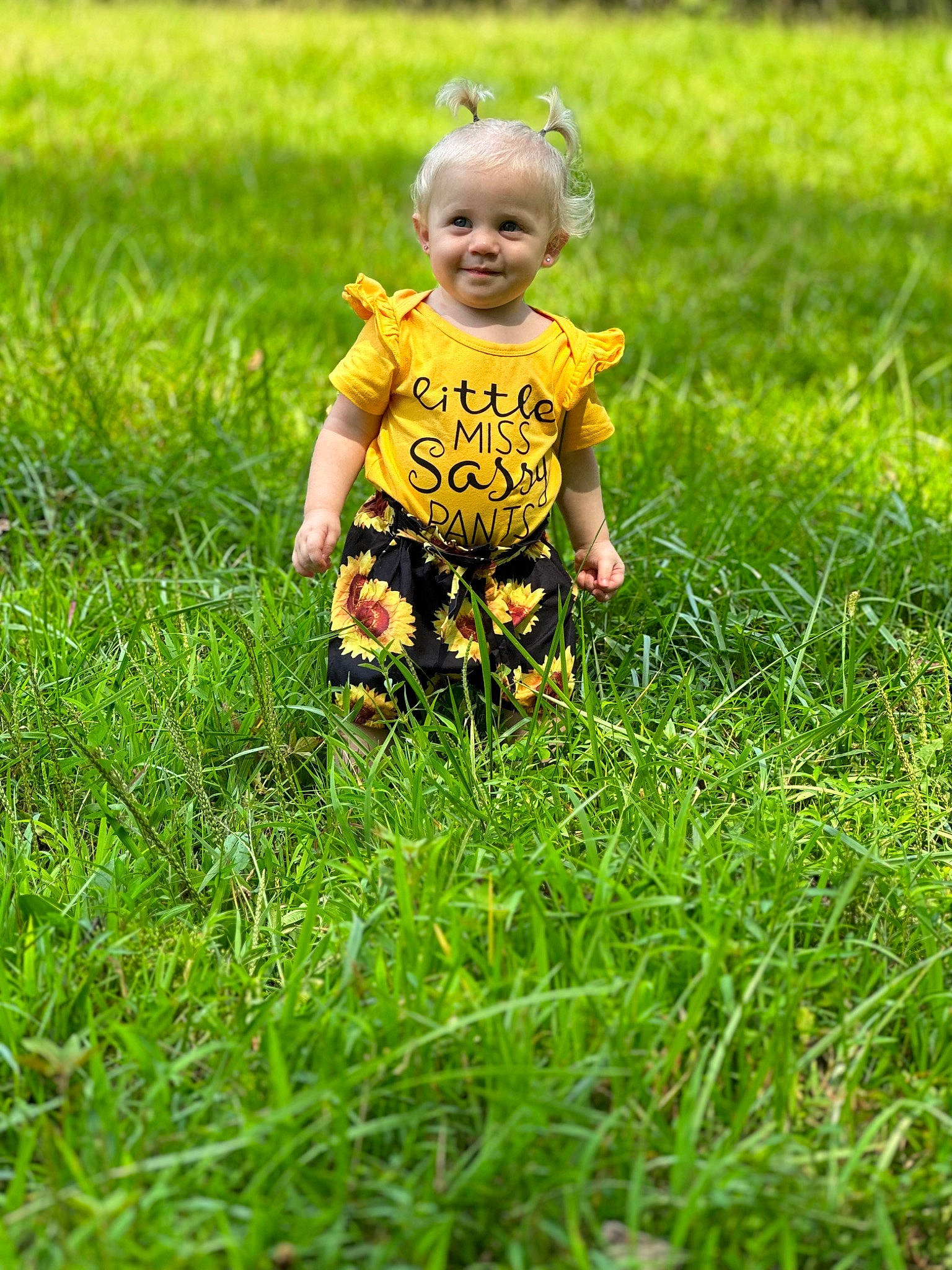 Blakely joined the competition — help win amazing prizes! baby, baby_toddler_clothing, child, eye, fun, grass, grass_family, grassland, groundcover, happy, hat, joy, landscape, lawn, meadow, natural_landscape, people_in_nature, person, plant, prairie