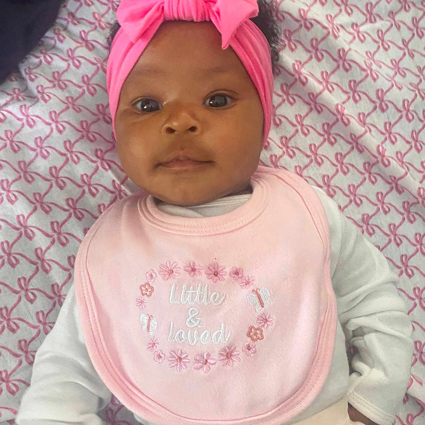 Mia is registered to the contest to win money with this photo: accessories, baby, bodypart, bonnet, clothing, face, hair, happy, hat, head, headband, person, photography, portrait, shoulder, sleeve, smile, standing