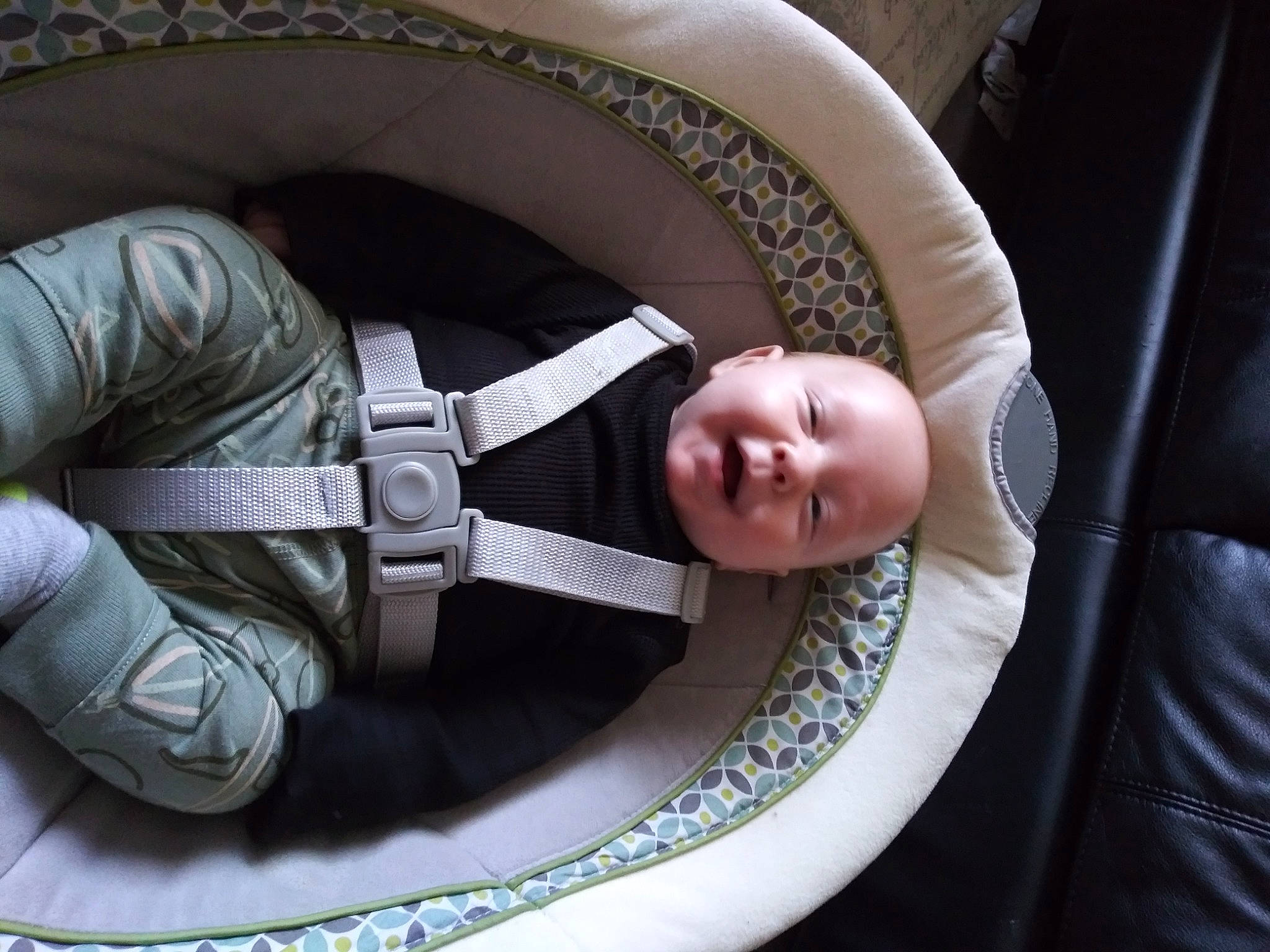 Timothy is registered to the contest to win money with this photo: arm, auto_part, baby, baby_carriage, baby_products, baby_toddler_clothing, chair, cheek, child, comfort, eye, hand, head, leg, person, product, sitting, sleeve, smile, toddler