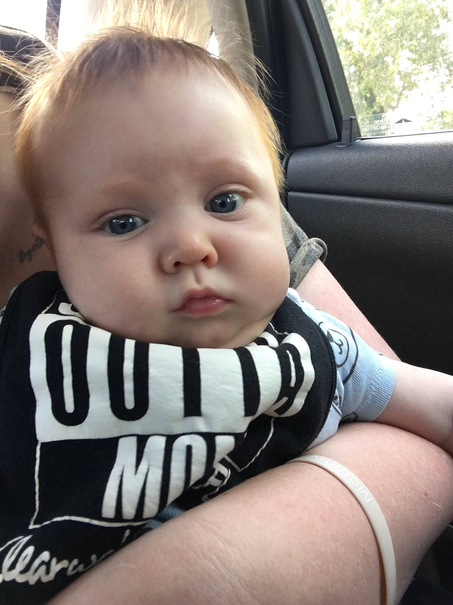 Jakobe is registered to the contest to win money with this photo: arm, auto_part, baby, baby_in_car_seat, baby_products, car_seat, cheek, child, cool, eye, face, finger, hand, head, person, product, skin, smile, toddler