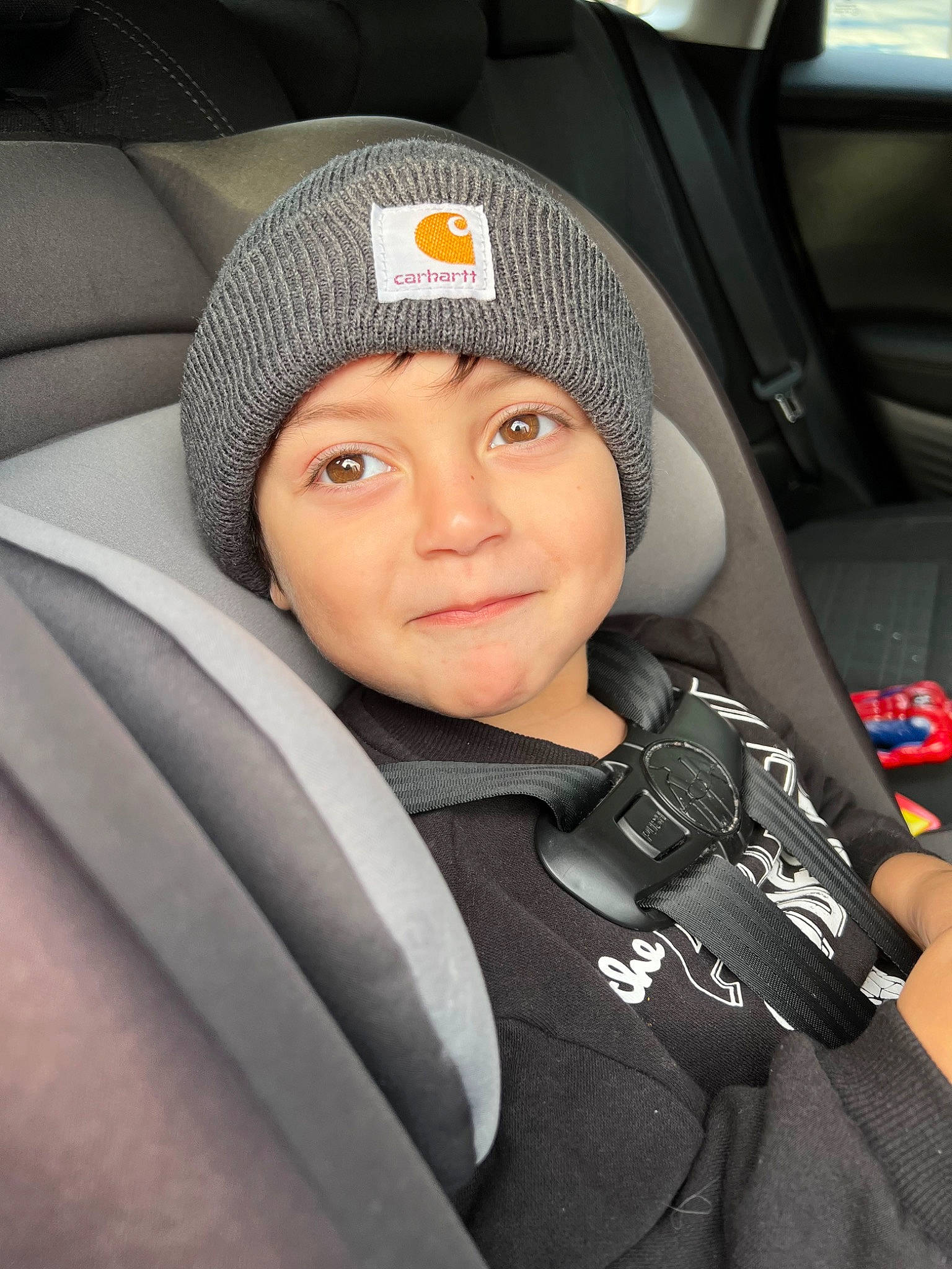 Mason joined the competition — help win amazing prizes! auto_part, automotive_design, car, car_seat, car_seat_cover, child, comfort, cool, family_car, flash_photography, head_restraint, headwear, luxury_vehicle, motor_vehicle, person, personal_luxury_car, smile, steering_part, steering_wheel, toddler