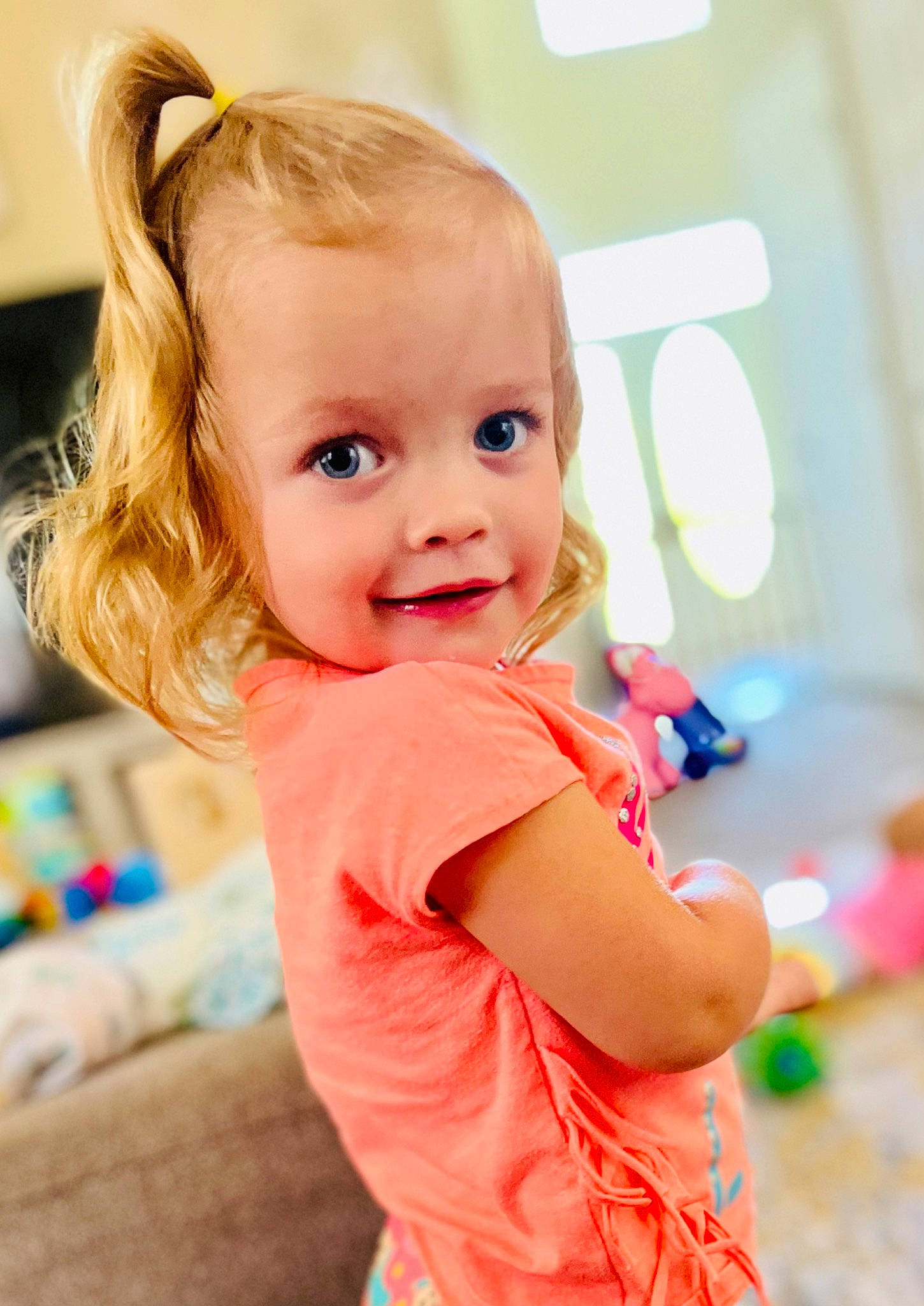 Theabelle is registered to the contest to win money with this photo: baby, baby_toddler_clothing, blond, cheek, child, couch, eyelash, facial_expression, fun, hairstyle, happy, iris, joy, leisure, person, recreation, shoulder, skin, sleeve, smile