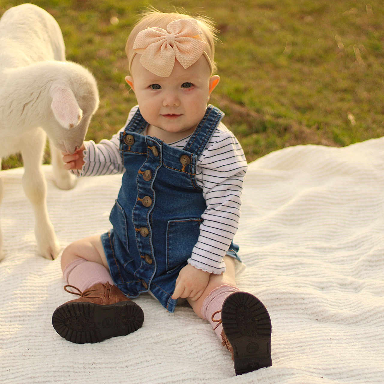 Hensley is registered to the contest to win money with this photo: art, baby, baby_toddler_clothing, child, fawn, foot, fun, fur, grass, happy, head, human_body, leisure, people_in_nature, play, sitting, sleeve, toddler, toy, wood