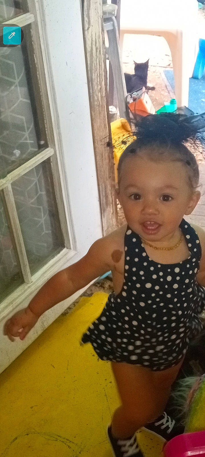 Jenna joined the competition — help win amazing prizes! baby, baby_toddler_clothing, cheek, chest, child, eyelash, fun, happy, human_leg, pattern, person, play, room, sitting, smile, thigh, thumb, toddler, trunk, vacation