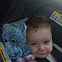 Summer joined the competition — help win amazing prizes! baby, child, car_seat, plush_toy, elephant, smile, face, closeup, hair, seatbelt, infant, cute, indoors, soft_toy, child_safety, car, person, portrait, toddler, snuggle