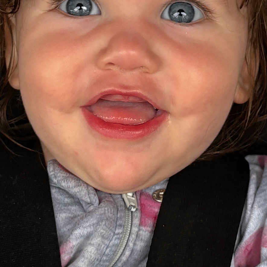 Haizlee is registered to the contest to win money with this photo: accessories, baby, belt, bodypart, clothing, coat, face, finger, hand, happy, head, mouth, pants, person, photography, portrait, seatbelt, smile, strap, teeth