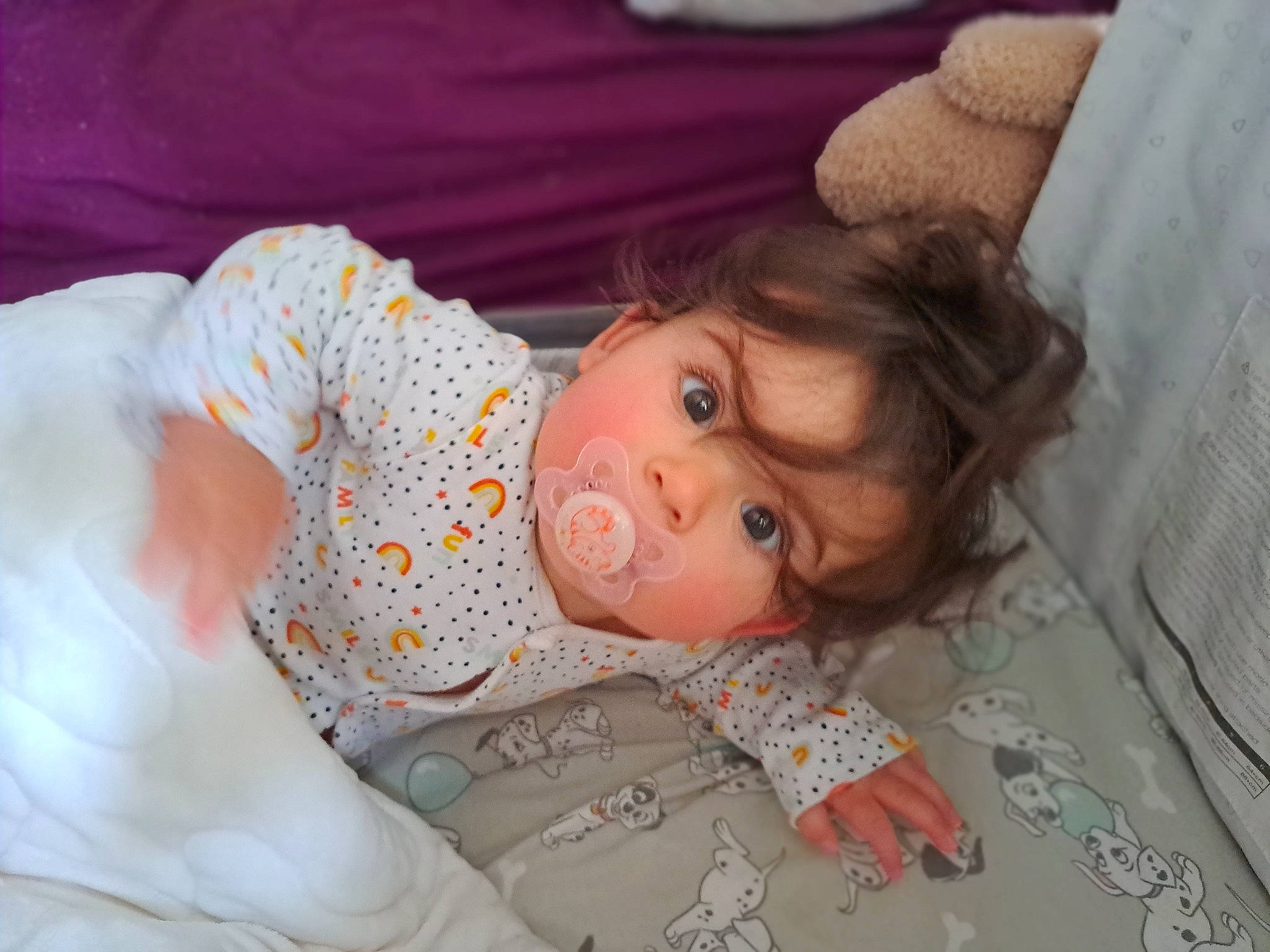 Julie is registered to the contest to win money with this photo: baby, baby_toddler_clothing, bedding, bedtime, cheek, child, comfort, eye, face, head, iris, linens, lip, nap, nose, pattern, person, room, sleep, sleeve