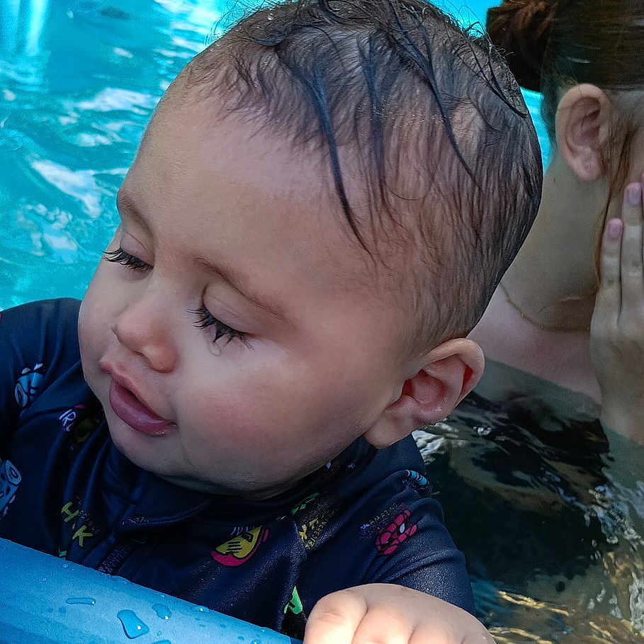 Jamalakai joined the competition — help win amazing prizes! baby, blue_pool, child, face, fence, hand, nature, outdoor, person, playing, pool, relaxing, skin, summer, sunlight, swimwear, toddler, tree, water, wet_hair
