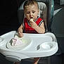 toddler, child, high_chair, cake, food, messy, face, eating, red_shirt, indoor, plate, foot, hand, frosting, baby, person, furniture, seat, smudge, celebration