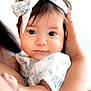 baby, infant, child, face, headband, bow, eyes, hands, arm, skin, clothing, white, blue, soft_light, portrait, closeup, cute, toddler, person, holding