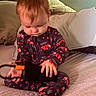 Noah joined the competition — help win amazing prizes! toddler, child, baby, pajamas, firetruck_pattern, bed, pillow, blanket, foot, hand, face, hair, indoor, playing, electronic_device, cable, curly_hair, person, cute, exploring