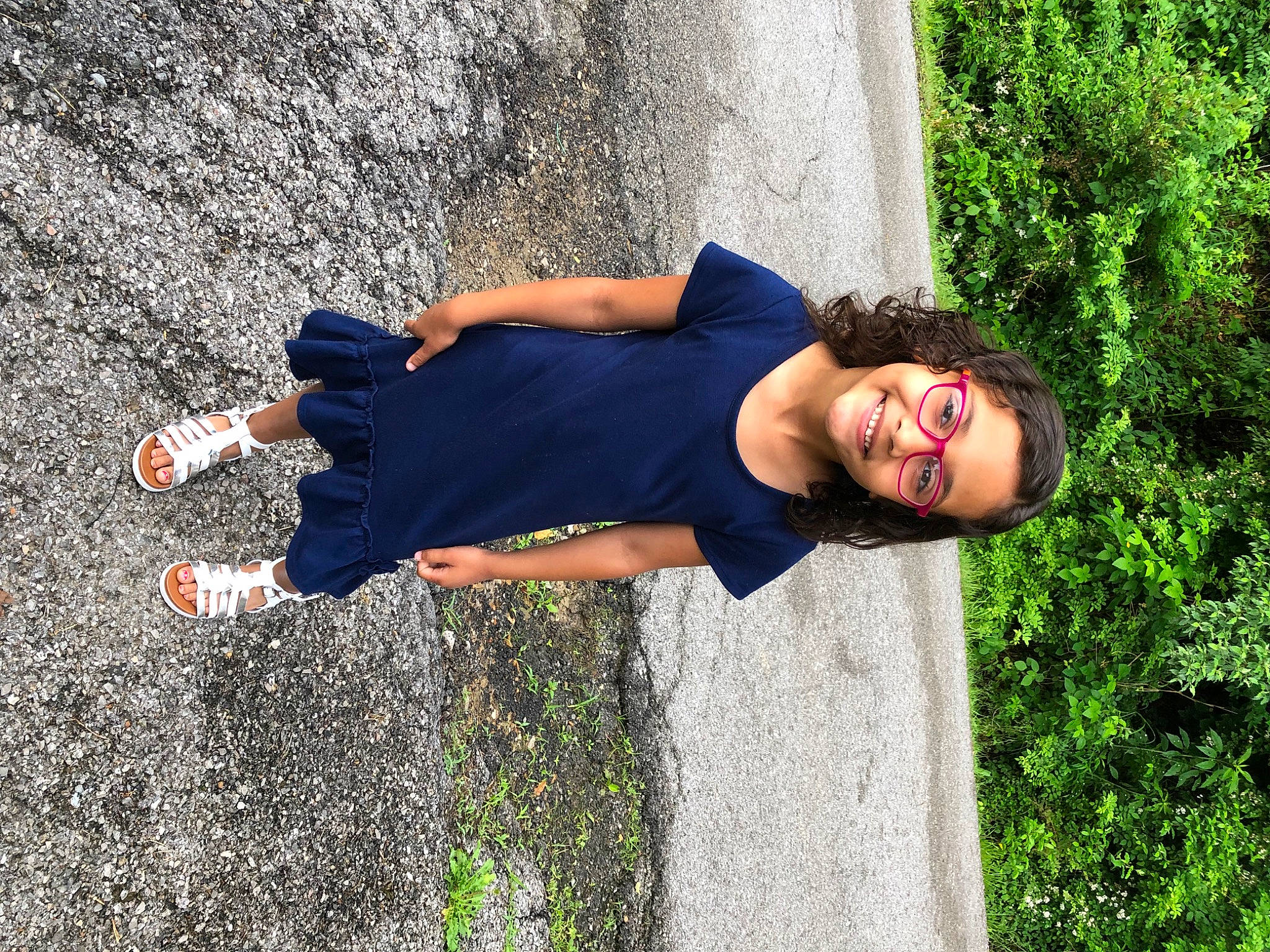 Elin joined the competition — help win amazing prizes! asphalt, child, denim, electric_blue, eyewear, fun, glasses, grass, grass_family, happy, human_leg, joy, landscape, leisure, people_in_nature, person, plant, recreation, shrub, smile