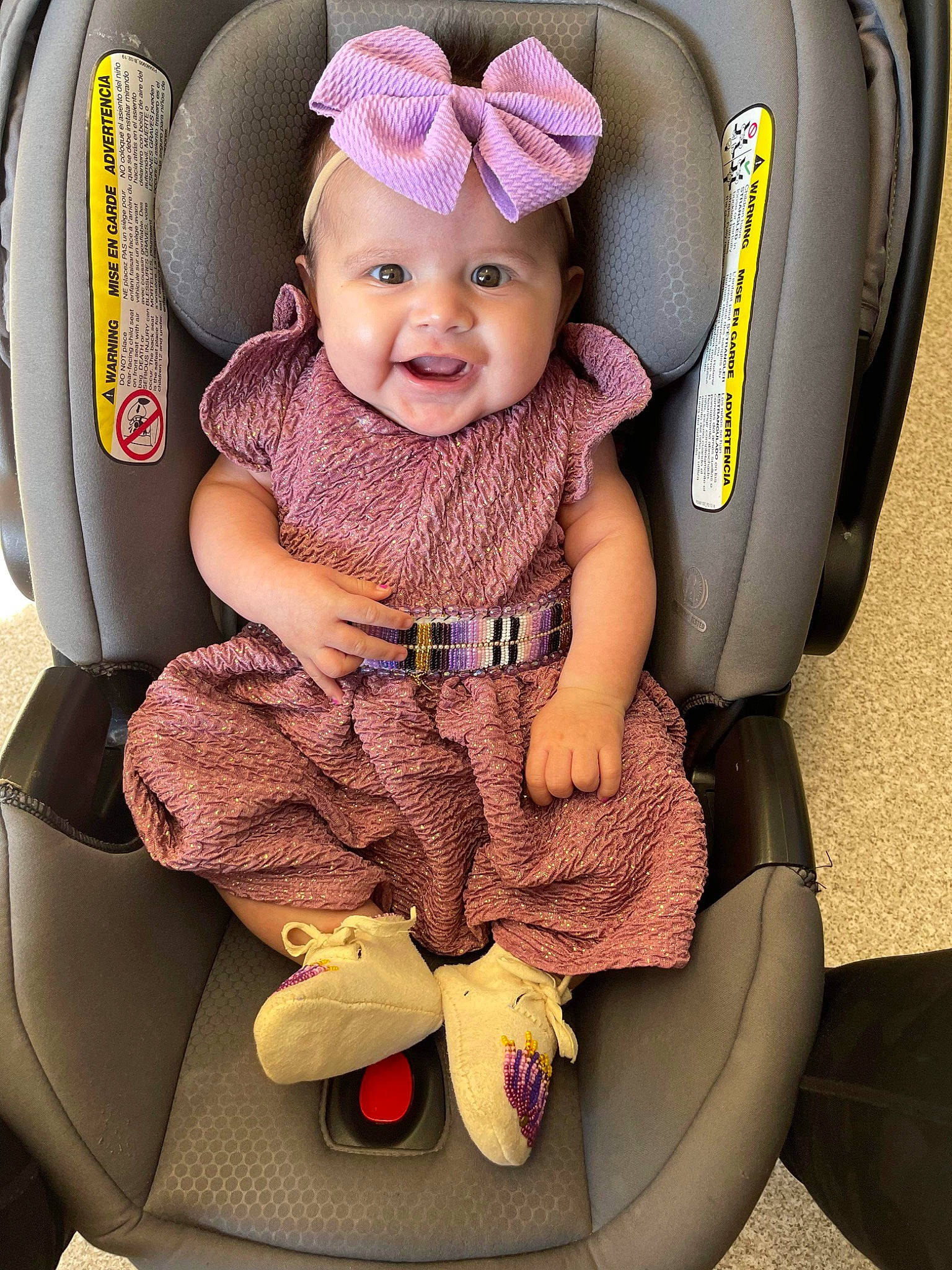 Taisley is registered to the contest to win money with this photo: auto_part, baby, baby_carriage, baby_in_car_seat, baby_products, baby_toddler_clothing, bag, car_seat, child, comfort, family_car, fashion_accessory, fun, happy, headwear, magenta, person, product, seat_belt, sitting