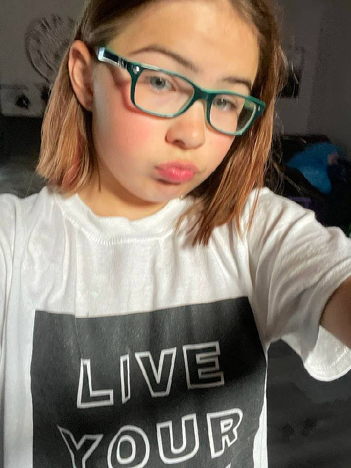 Kennedy joined the competition — help win amazing prizes! cheek, chin, ear, eyebrow, eyelash, eyewear, facial_expression, forehead, glasses, hair, hairstyle, head, jaw, lip, neck, organ, person, photograph, skin, sleeve