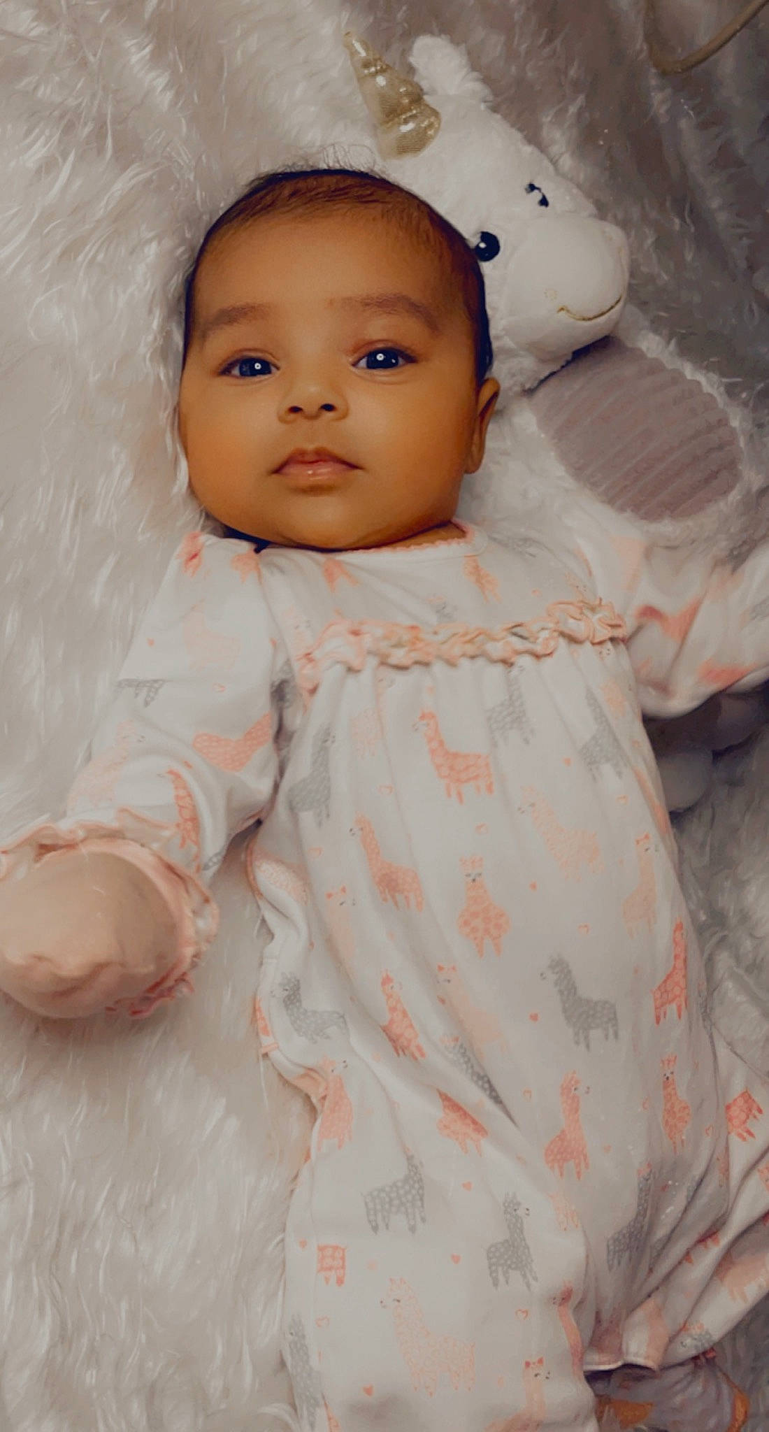 Lucille is registered to the contest to win money with this photo: baby, baby_toddler_clothing, cheek, dress, eye, eyebrow, eyelash, face, head, iris, linens, lip, neck, nose, outerwear, person, pink, skin, sleeve, toddler