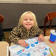 Kenzie is registered to the contest to win money with this photo: boy, chair, child, desk, diagram, diningtable, face, female, furniture, girl, head, male, pen, person, photography, plate, portrait, sitting, table, tabletop