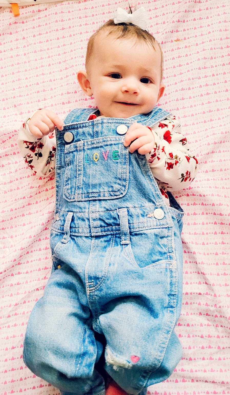Kayli joined the competition — help win amazing prizes! baby, baby_toddler_clothing, collar, denim, dress_shirt, face, gesture, hand, happy, head, human_body, iris, joy, leg, people_in_nature, person, pink, skin, sleeve, smile