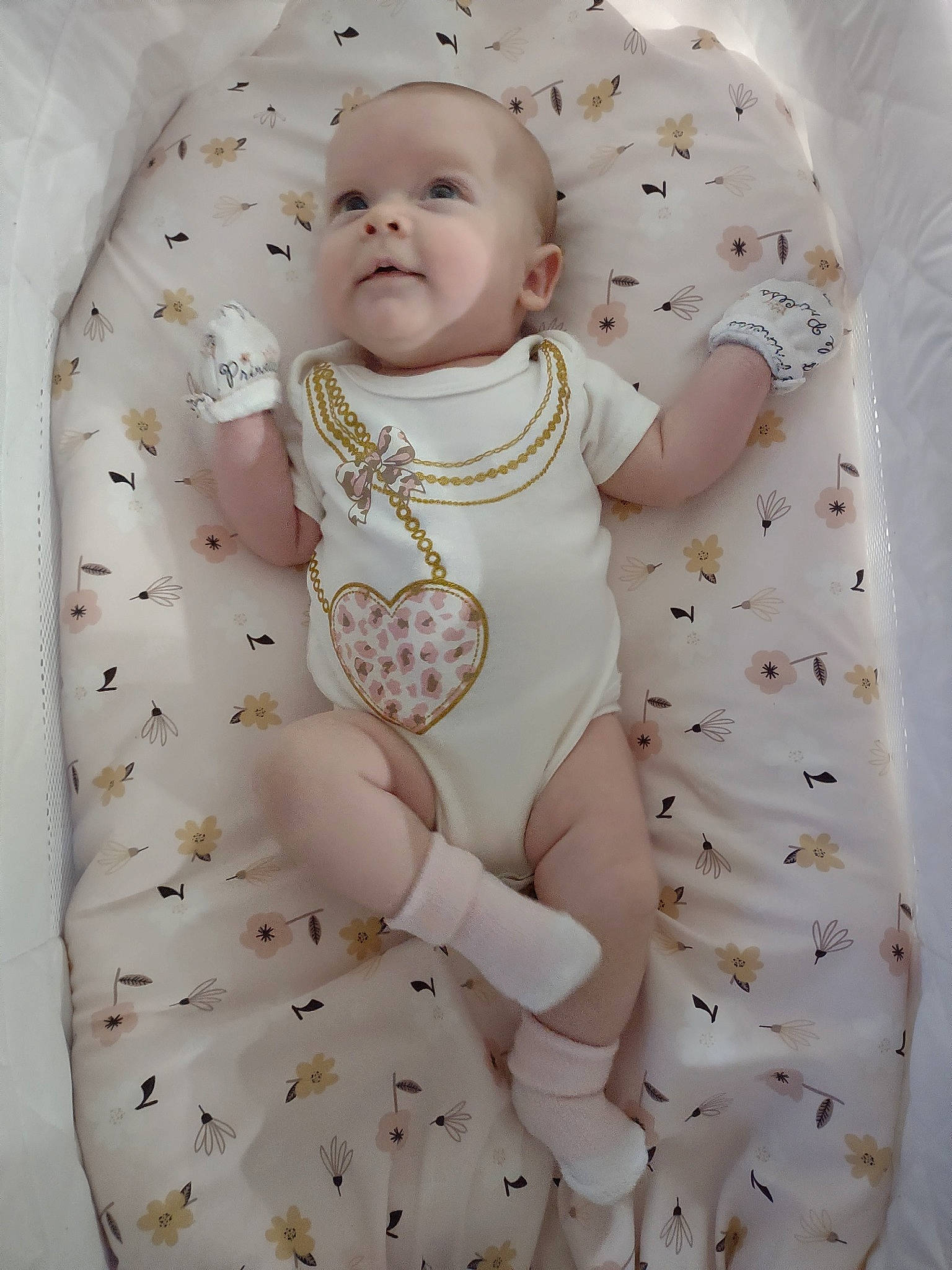 Saphira joined the competition — help win amazing prizes! arm, baby, baby_products, baby_safety, baby_sleeping, baby_toddler_clothing, bedding, chest, child, comfort, hand, infant_bodysuit, linens, pattern, person, pink, sitting, skin, sleeve, thumb
