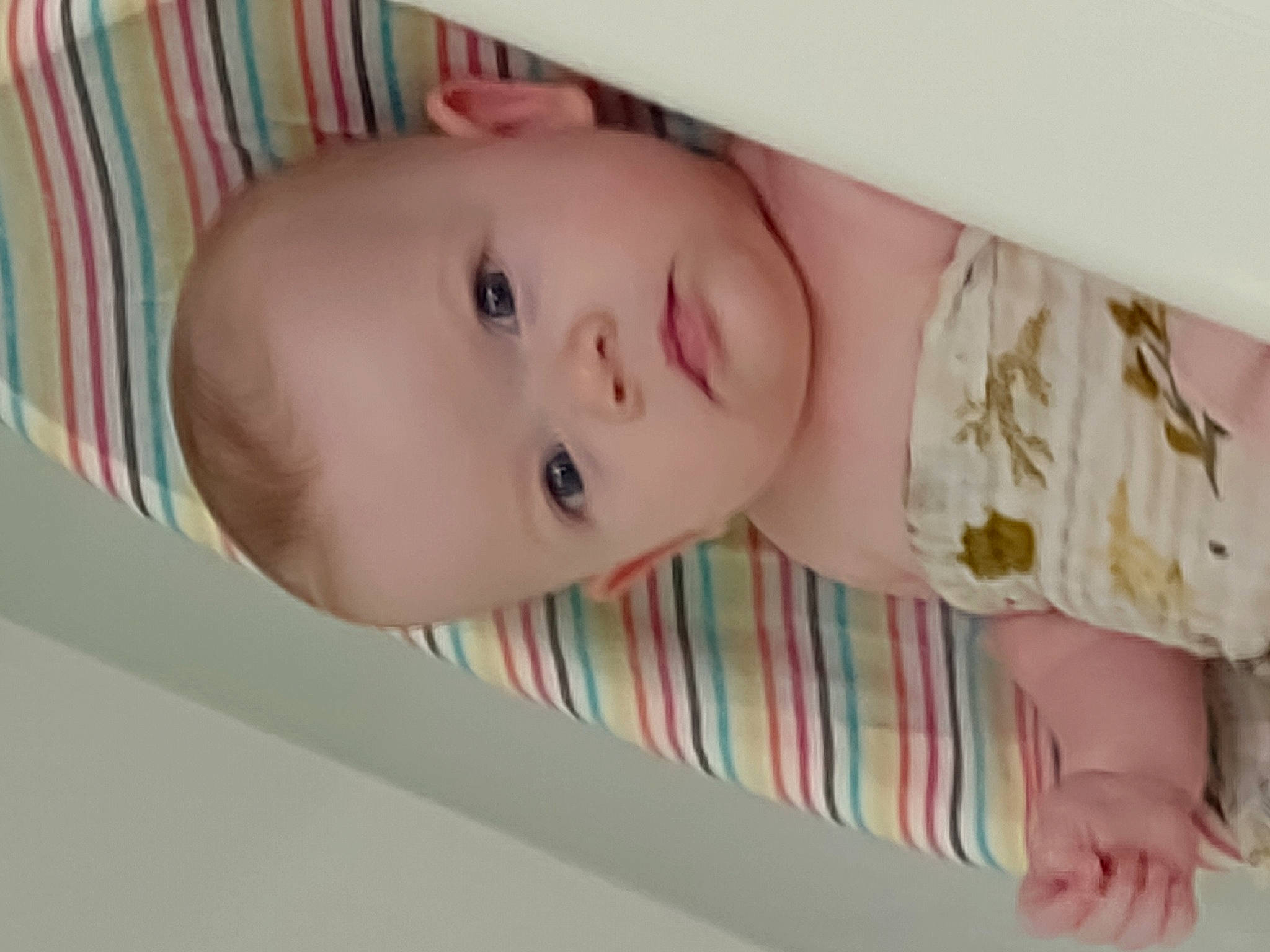 Saphira is registered to the contest to win money with this photo: baby, baby_products, baby_toddler_clothing, cheek, child, dress, eyebrow, eyelash, facial_expression, human_body, iris, linens, lip, nose, pattern, person, pink, skin, sleeve, toddler