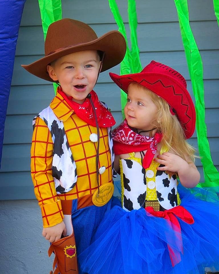 Makenzie joined the competition — help win amazing prizes! baby_toddler_clothing, child, costume, costume_hat, cowboy_hat, day_dress, entertainment, event, fashion_accessory, fun, happy, hat, headgear, headwear, magenta, pattern, person, smile, sun_hat, toddler