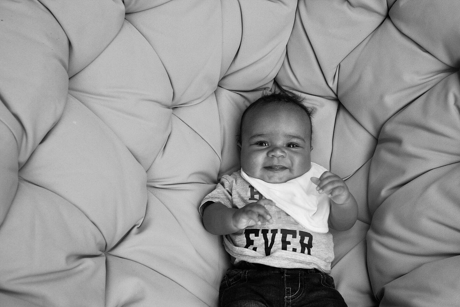 Elon is registered to the contest to win money with this photo: baby, black_and_white, child, facial_expression, family, fun, gesture, happy, laugh, monochrome, monochrome_photography, people, person, photograph, photography, smile, style, toddler