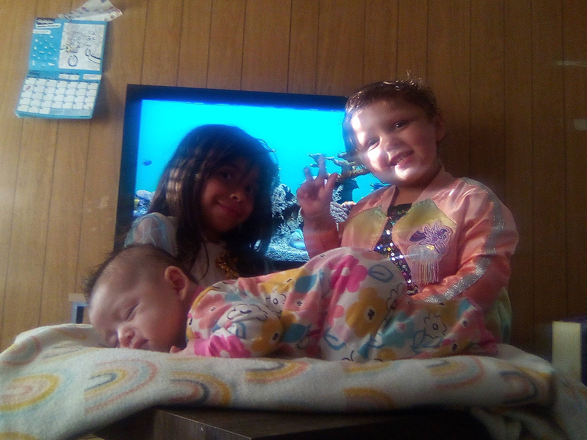 Rosa Adaia is registered to the contest to win money with this photo: baby, child, comfort, couch, display_device, electronic_device, event, finger, fun, happy, iris, joy, lap, living_room, mouth, person, room, sitting, smile, television