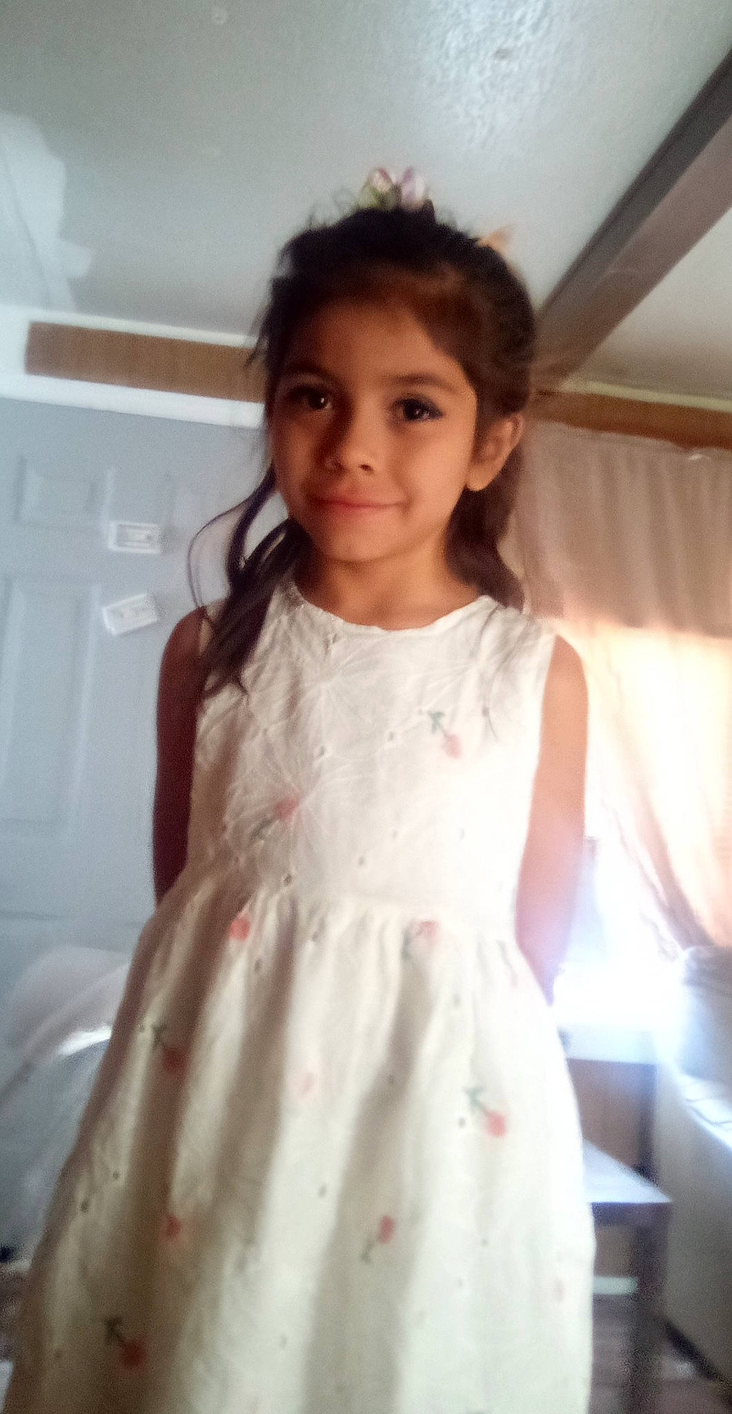 Rosa Adaia joined the competition — help win amazing prizes! baby_toddler_clothing, bridal_accessory, day_dress, dress, embellishment, face, formal_wear, gown, hair, hairstyle, happy, head, joy, long_hair, neck, one_piece_garment, person, shoulder, skin, sleeve