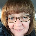 Kris B.