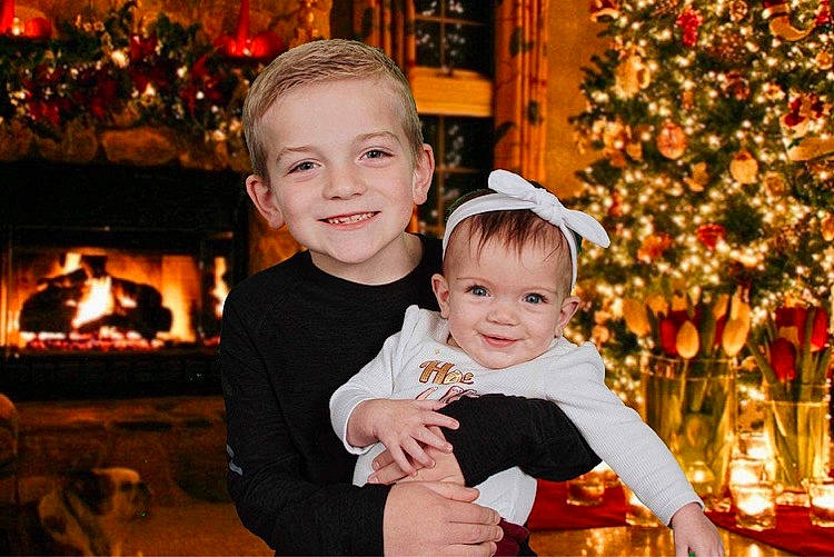 Hayven is registered to the contest to win money with this photo: baby, baby_toddler_clothing, beauty, child, christmas, christmas_decoration, christmas_ornament, christmas_tree, face, facial_expression, flash_photography, fun, happy, head, human, joy, person, photograph, smile, standing