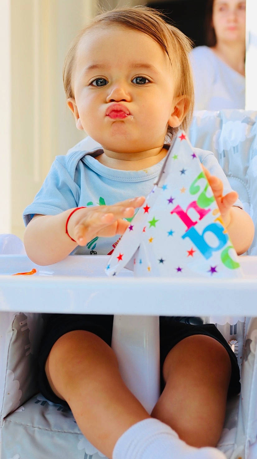 Jayson is registered to the contest to win money with this photo: baby, baby_playing_with_food, baby_toddler_clothing, baked_goods, baking, bib, buttercream, cake, cake_decorating, cake_decorating_supply, candy, child, dessert, ear, eyelash, foot, person, skin, sugar_cake, sweetness