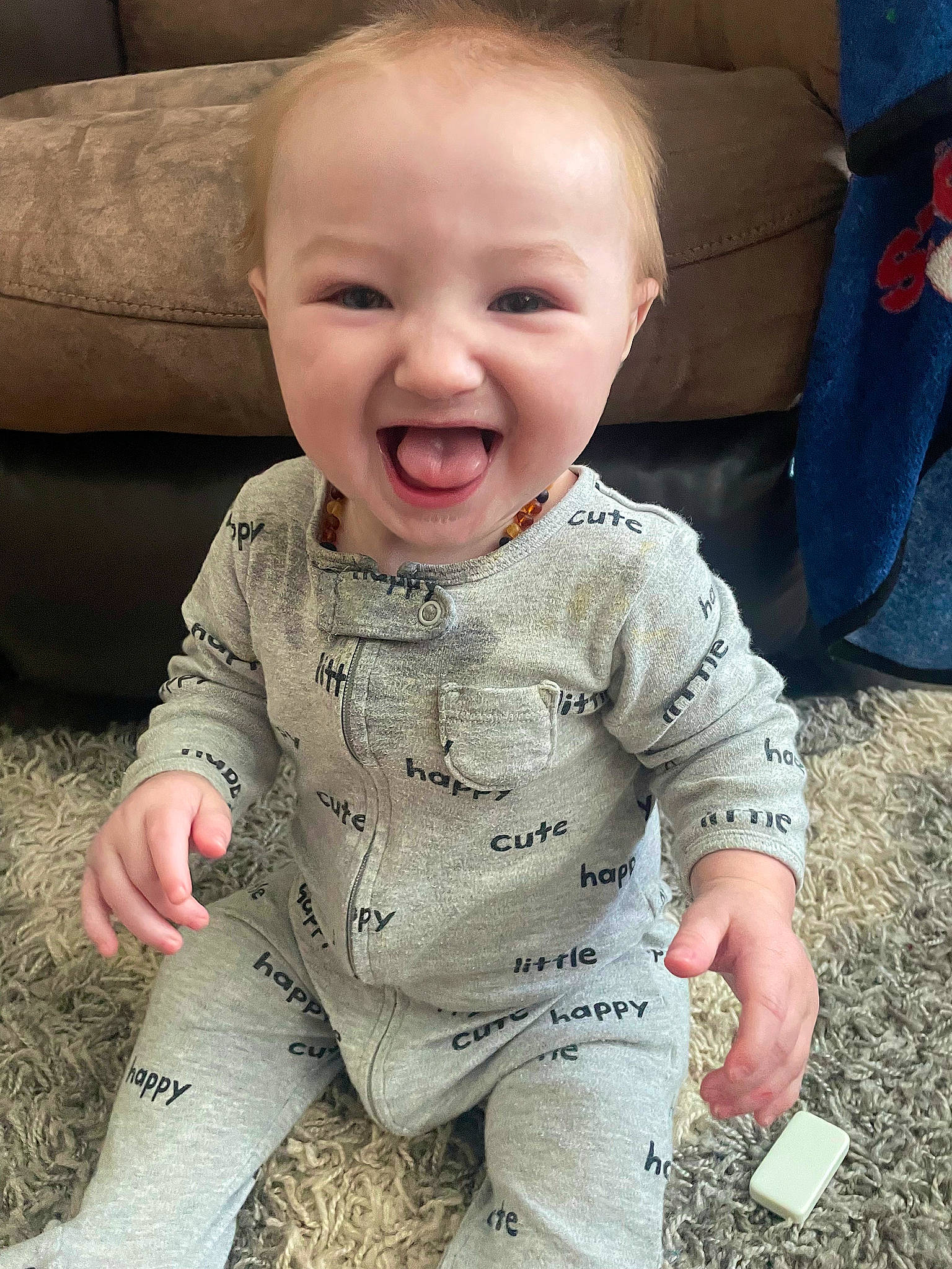 Jackson joined the competition — help win amazing prizes! baby, baby_toddler_clothing, cheek, child, comfort, eye, face, flooring, grass, happy, head, iris, lip, mouth, nose, person, sitting, skin, sleeve, smile